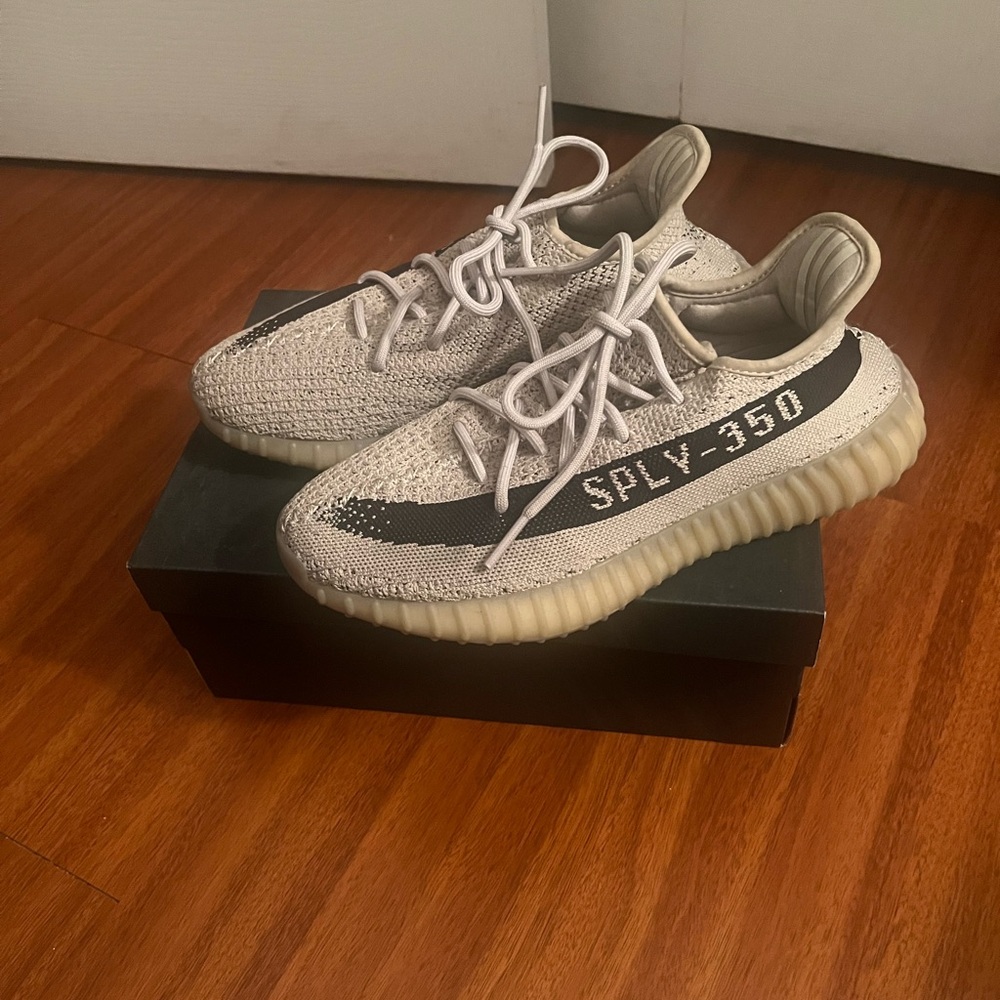 Yeezy Cream and Black Sneakers with Primeknit Upper and Ribbed Sole
